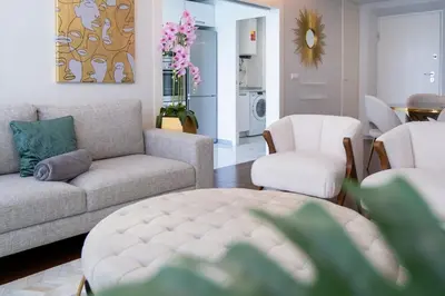 a living room with a couch and chairs and a table at Lux City Center Apart-Free Park EU in Funchal