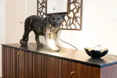 a statue of a dog on top of a cabinet at Lux City center apartments EX in Funchal