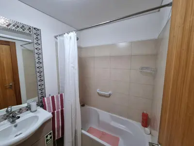 a bathroom with a tub and a sink and a shower at Blue Sky by Susys Holidays in Funchal