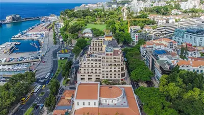 an aerial view of a city with a building at By the Sea VI - Marina in Funchal
