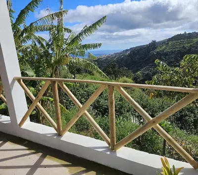 a balcony with a view of the mountains at Villa Júlia, Mountain retreat in Santa Cruz