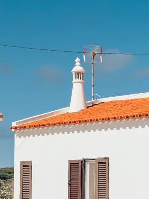 a white lighthouse on top of a white house at Villa Victoria, Tonel, Sagres in Sagres
