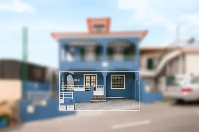 a model of a blue house is shown at Crab House 01 by GALMI in Machico