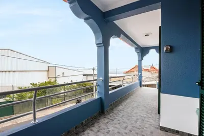 a view from the balcony of a building at Crab House 02 by GALMI in Machico