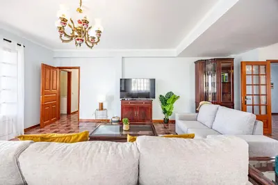 two beds sitting next to each other in a bedroom at Ocean Side Vista by YOUR KEY in Funchal
