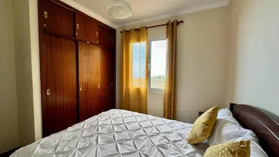 a bedroom with a bed and a window at Golden View in Gaula