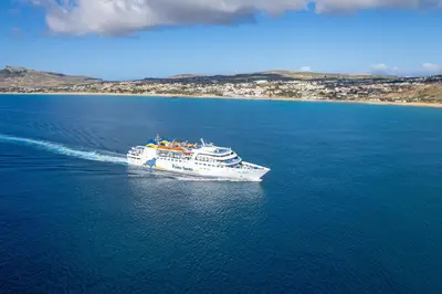 a cruise ship in the water near a beach at Apartamento da Vila by An Island Apart in Porto Santo