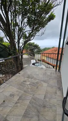 a balcony with a view of a tree at casa Farraia in Santana