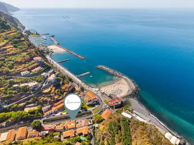an aerial view of a beach and the ocean at Luzia by the Sea - T1 Acolhedor a Passos da Praia in Calheta