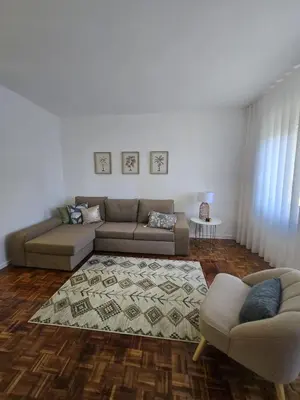 a living room with a couch and a chair at The Empress Atlantic Stay Free Parking in Funchal