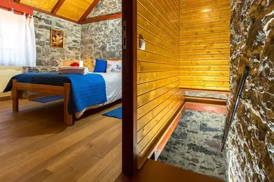 a room with a sauna with a bed in it at Casa Leonor by Rent2U, Lda in Arco da Calheta