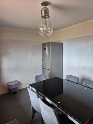 a conference room with a black table and chairs at North Coast View in Seixal
