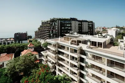 an aerial view of a city with tall buildings at Home By SG in Funchal