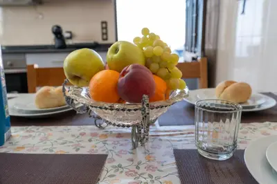 a bowl of fruit sitting on a table at Vista al Mar in Ribeira Brava