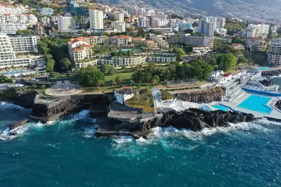 an aerial view of a city next to the ocean at OceanView Pearl Varino by Holiday Rental Madeira in Funchal