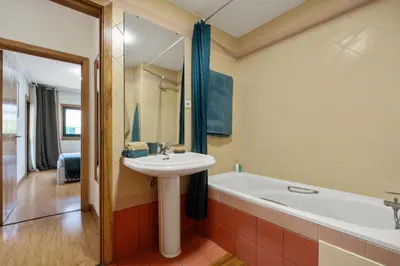 a bathroom with a sink and a bath tub and a sink at SUPER Anadia - Vintage in Funchal