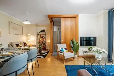 a living room with a table and chairs at SUPER Anadia - Vintage in Funchal