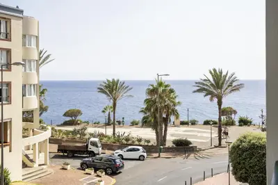 a view of the ocean from a building at Doca's Refuge by Homie in Funchal