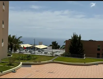 a view of a building from a courtyard at Garajau Madeira Holidays in Caniço