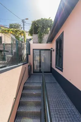 a stairway leading up to a building at Casa do Moinho by Mill Escapes in Funchal