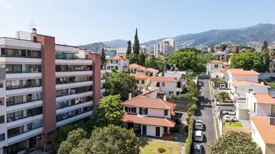 an aerial view of a city with houses at Residential Camacho, By OP in Funchal
