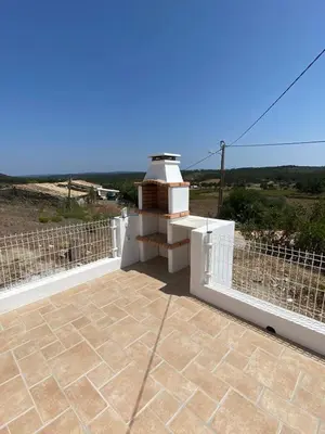 a balcony with a white fence and a view at Sunny Aljezur da Misericórdia, Aljezur, Costa Vicentina in Aljezur