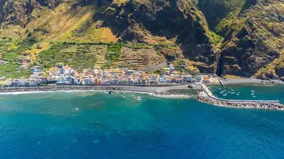 an aerial view of a village on a beach at Yellow Wave in Paul do Mar