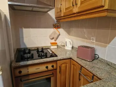 a kitchen with a stove and a counter top at Pico Ferreira by MTH in Tábua