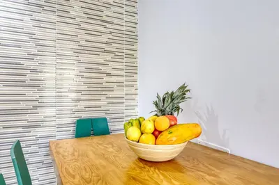 a bowl of fruit sitting on top of a table at Casa da Tia Celeste II, a Home in Madeira in Ponta do Sol