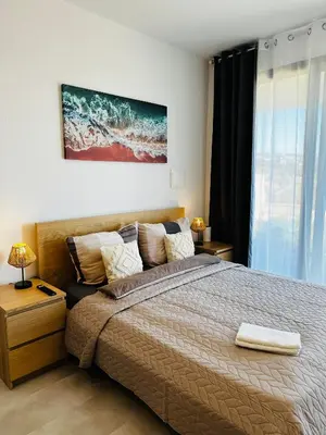 a white door in a room with a white wall at CoLiving Funchal in Funchal