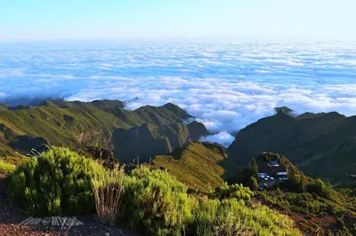 a view from the top of a mountain with clouds at Top Floor in Flor do Campo - Santana in Santana