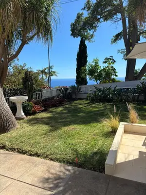 a park with the ocean in the background at Casa Marguerite Gym and Hammam by Rentallido in Caniço