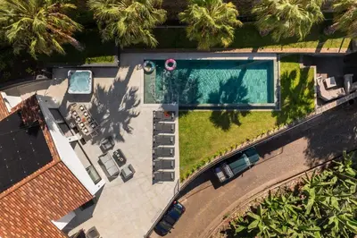 an overhead view of a swimming pool in a house at Garden Villa by An Island Apart in Funchal