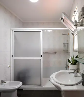 a white bathroom with a shower and a sink at Taste of the Sea by Formosa in Funchal