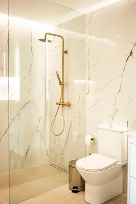 a bathroom with a toilet and a shower at Hidden Corner by Sabugo House in Ponta do Sol