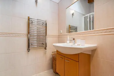 a bathroom with a sink and a mirror at Peaceful and lovely retreat with a pool #1982 in Barão de São Miguel