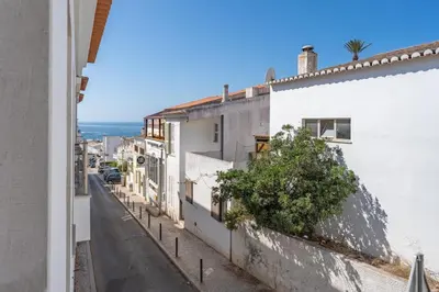 a view of a street with white buildings at Aurazul Apartment in Luz