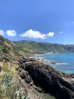 a view of the ocean from a rocky beach at Lovely house on Santa Maria Island Azores in Santa Bárbara