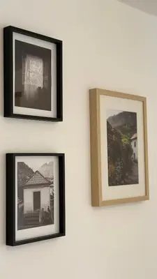 four pictures hanging on a wall in a room at Old Aqueduct Village 1 - Guesthouse - Madeira in Serra de Água