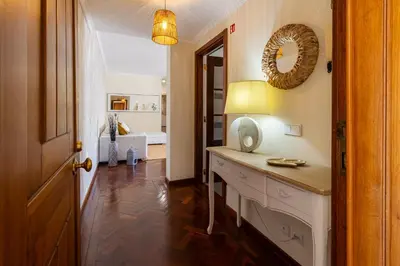 a bathroom with a toilet and a sink at Piornais Views, perto da Praia Formosa in Funchal