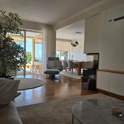 a living room with a couch and a table at Casa Azul in Luz