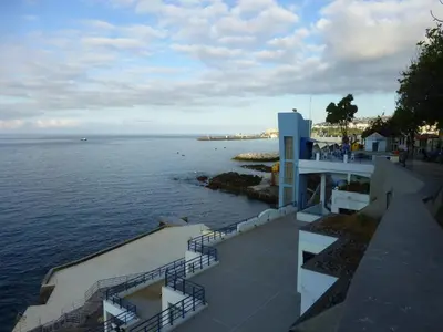 a view of the ocean from a building at Shearwaternest Apartment AL in Funchal