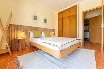 a bedroom with a bed in a room at Beach Retreat - By Wehost in Porto Santo