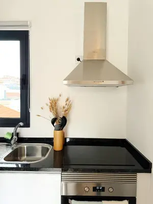 a kitchen with a sink and a stove at S A L - Village Flats in Caniçal