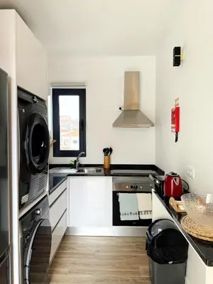 a kitchen with a sink and a stove at S A L - Village Flats in Caniçal