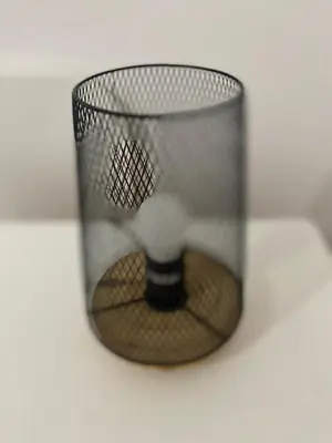 a bird cage with a bird inside of it at Sea La Vie Apartment Porto Santo in Porto Santo