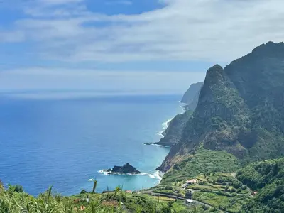 a view of the ocean and a mountain at Vista Ventura in Ponta Delgada