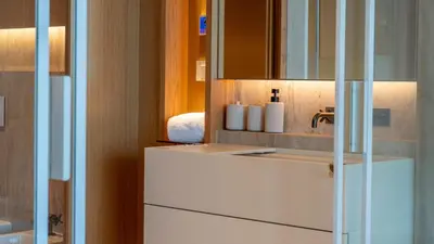 a bathroom with a sink and a mirror at Oceanalis by LovelyStay in Funchal