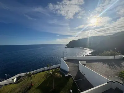 an aerial view of the ocean near a rocky coast at Almar Ocean Retreat in Gaula