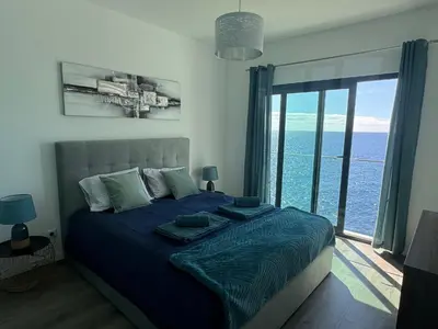 a view of the ocean from a house at Almar Ocean Retreat in Gaula